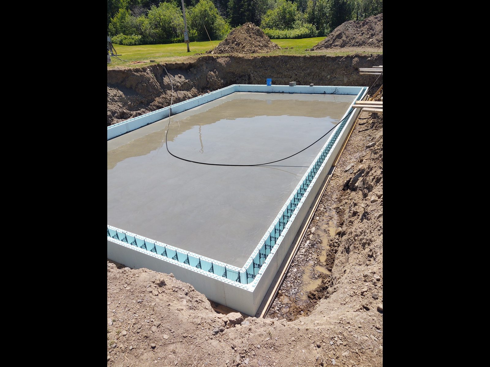 Poured concrete basement foundation
