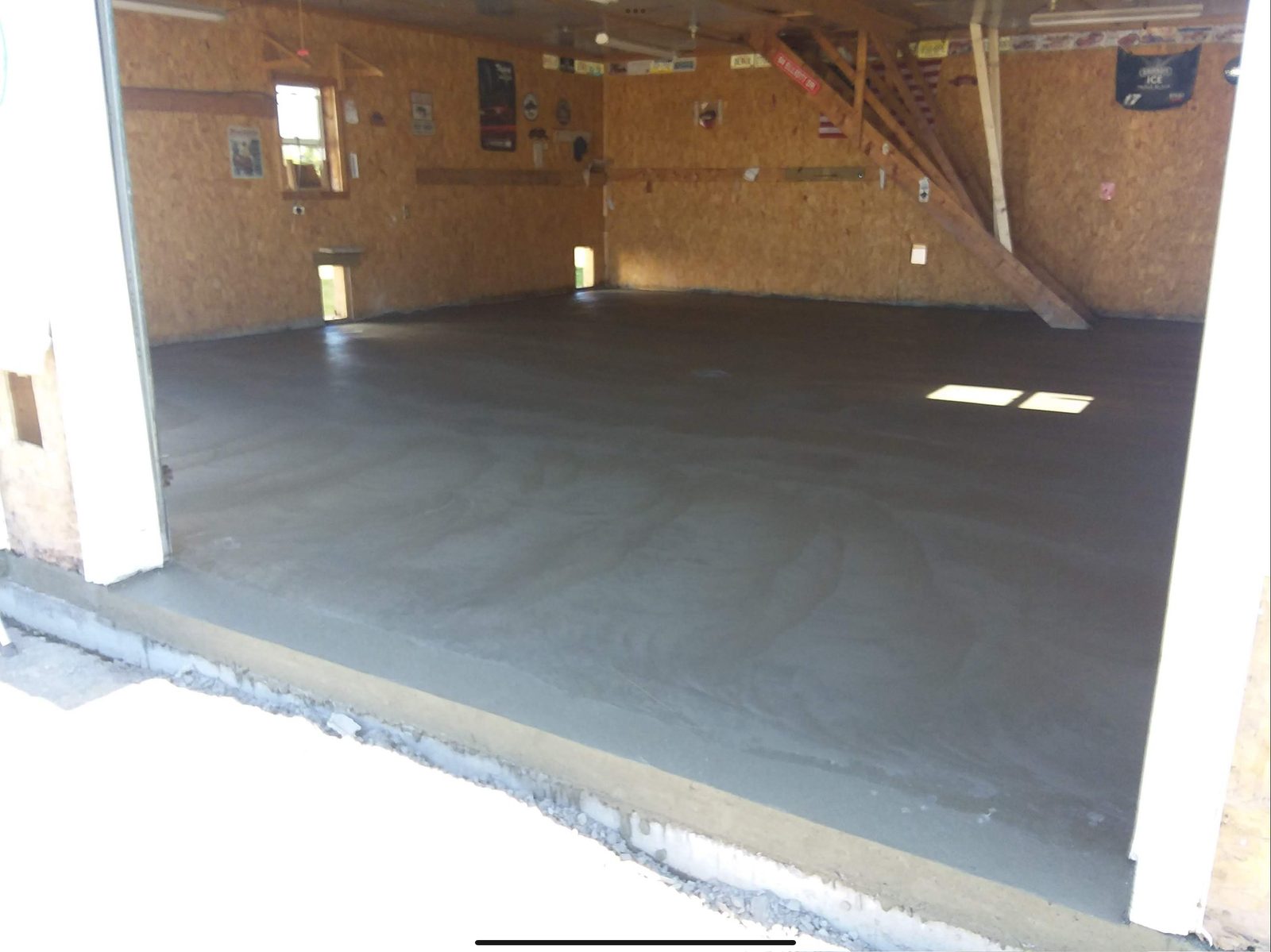 Freshly poured garage floor concrete slab
