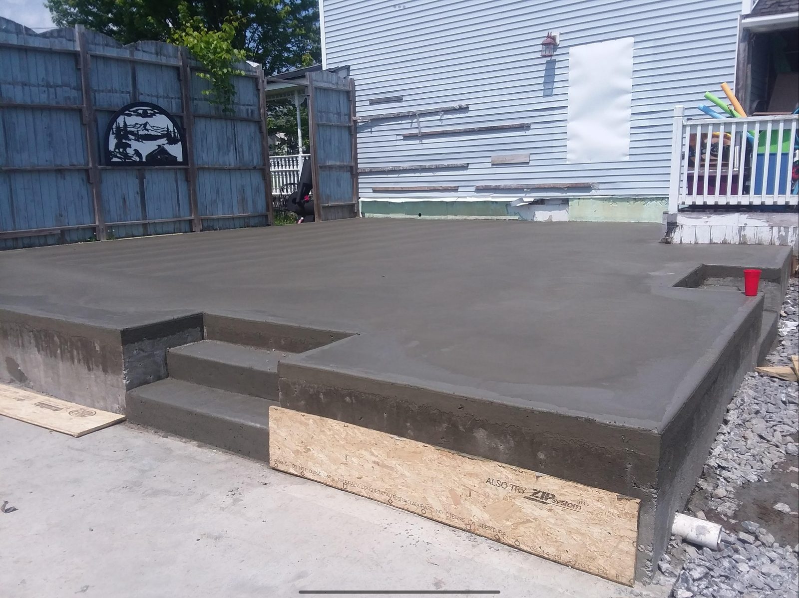 Finished concrete patio with steps